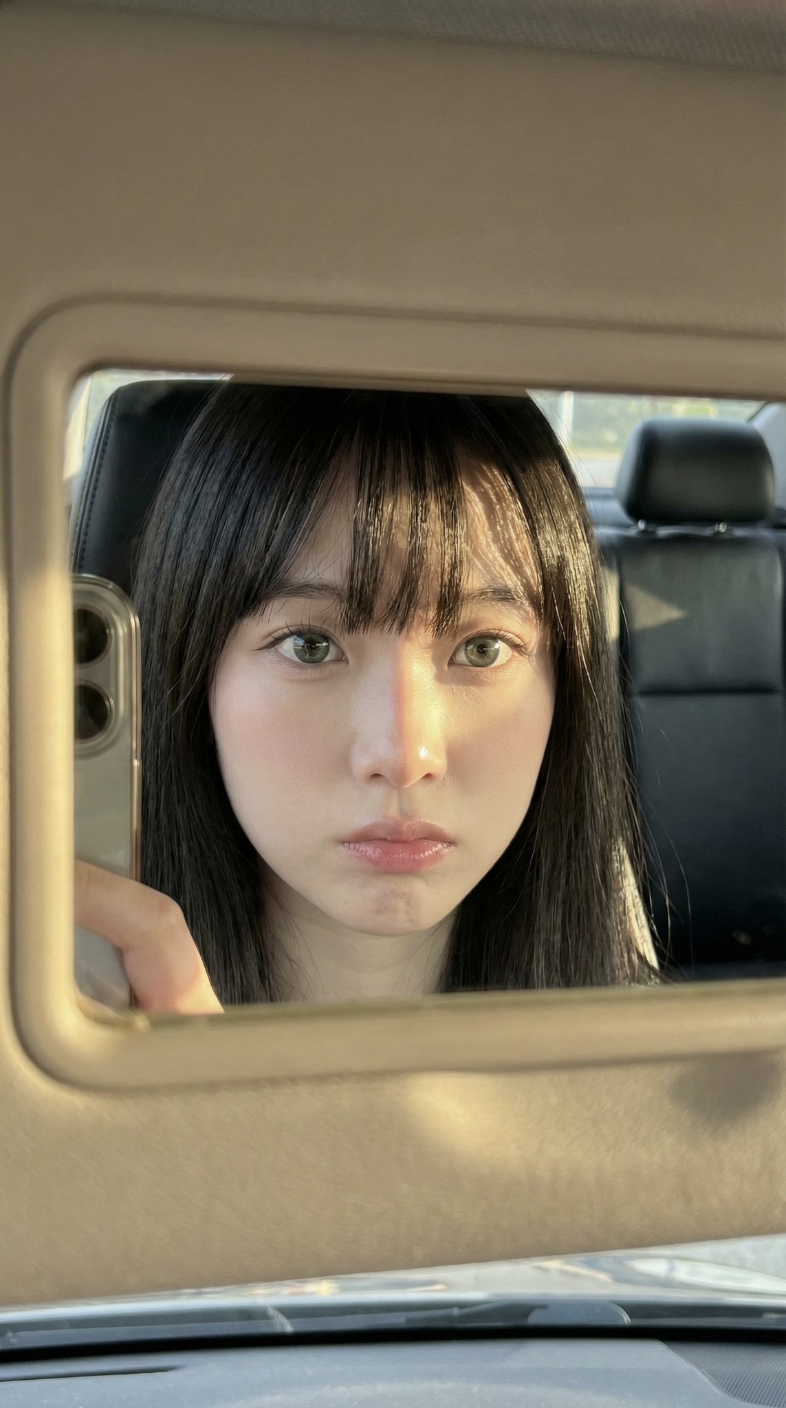 Face Reflection in Car Mirror