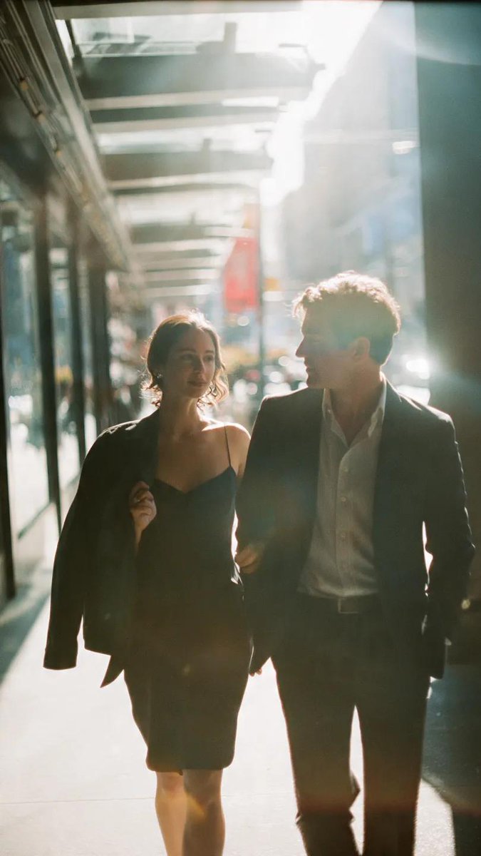 Couple Walking Urban Walkway