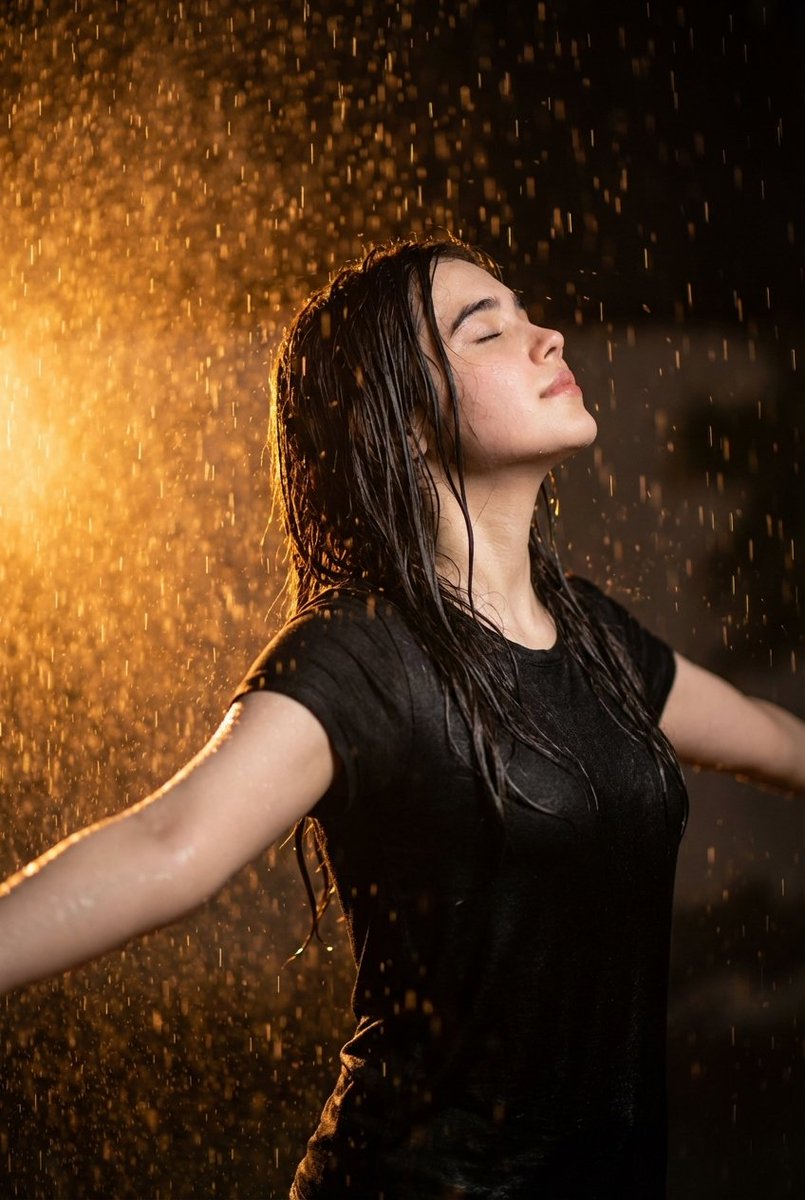 Woman in Rain at Night